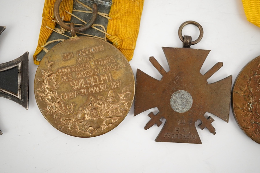 Five German WWI medals; two Second class Iron Crosses, two Kaiser Wilhelm Centenary medals and an Honour Cross 1914-1918. Condition - fair.